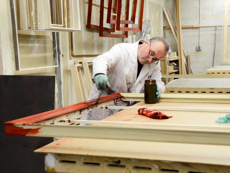 Mark LeSaffre hand finishing custom picture frames