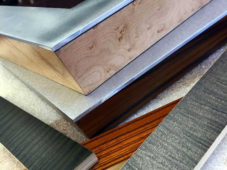 aluminum and exotic wood veneer picture frames